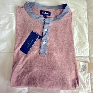 Heather Red Oxford
Men’s Henley Long Sleeve
NEW WITH TAGS
Size Medium